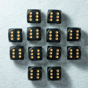 Boîte de 12 d6: Opaque Noir/Or Chessex
